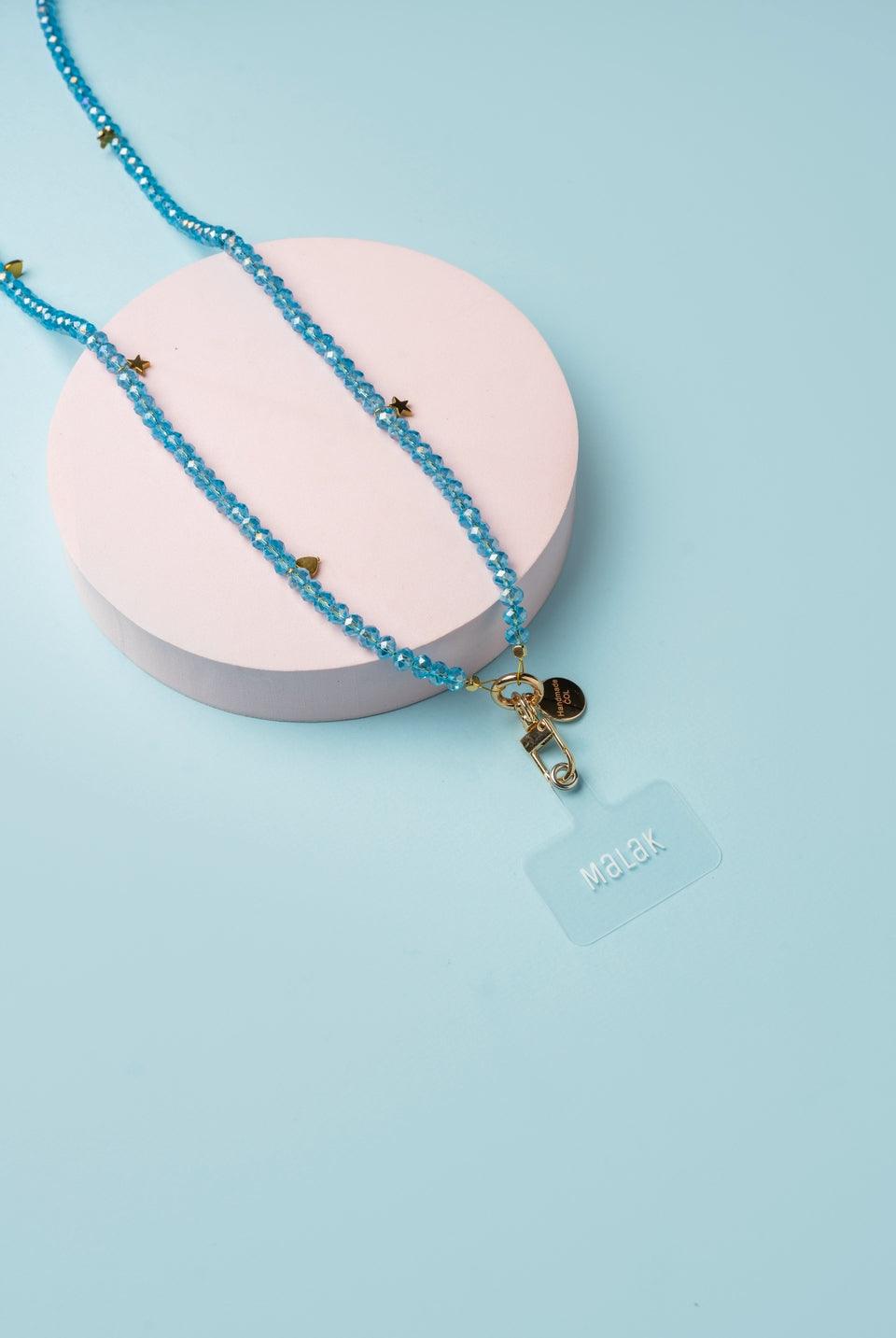 Strap para celular tejido a mano en cristal Murano, diseño exclusivo de Malak.