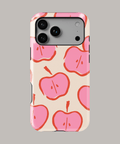 Funda personalizada para iPhone 16 con diseño de manzanas rosas sobre fondo blanco.