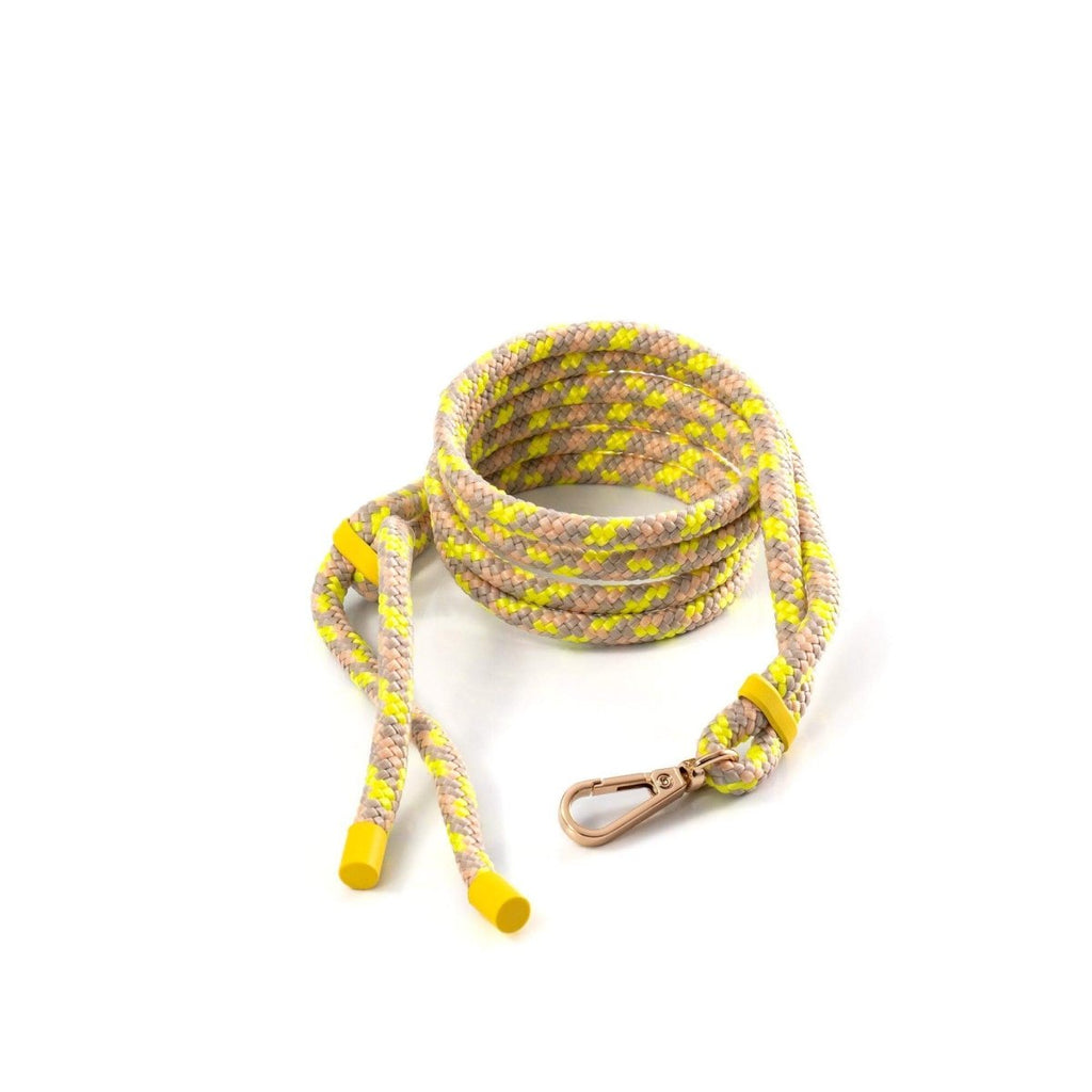 Cordón universal para teléfonos móviles en colores amarillo y rosa, resistente y duradero, ideal para todas las marcas.