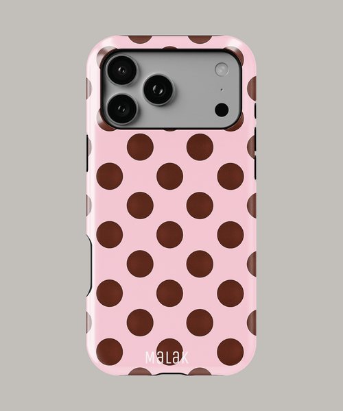 Funda personalizada para iPhone resistente con diseño de lunares en color rosa y marrón.