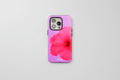 Fundas personalizadas para iPhone, funda morada con diseño de flor de hibisco en color rosa.