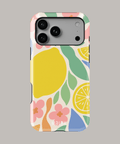 Funda personalizada para iPhone con diseño colorido de limones y flores, resistente y estilizada.
