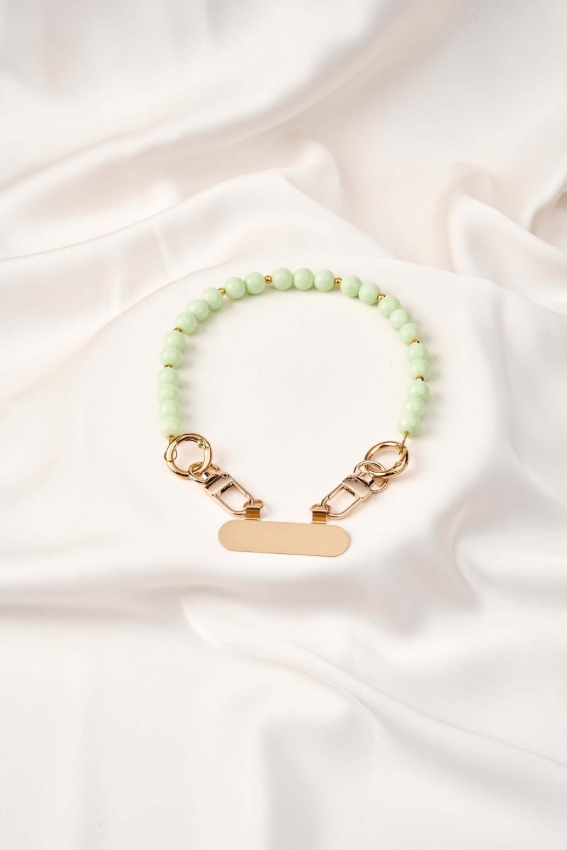 strap celular artesanal Mint Whisper, elaborado a mano con cristales Murano, cuenta con Sistema StrapSafe.