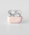 Fundas para AirPods con diseño de lunares en color rosa y amarillo, ideales para personalizar tus audífonos.