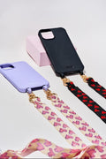 Set de funda y strap personalizado para iPhone en colores vibrantes y diseños únicos, accesorios hechos a mano.