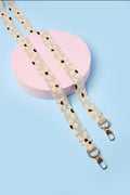 Straps de lujo plata con flor, elaborados a mano con más de 8.500 cristales de mostacilla, mostrando diseño elegante y broches de acero.