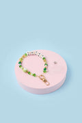 strap de lujo 35cms en tonalidades verdes, elaborado a mano, con perlas y sistema StrapSafe, ideal para celular.
