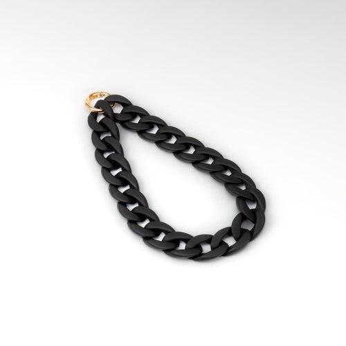 Cadena de lujo para funda de cuero negra, elegante y original, con broche dorado y diseño moderno.