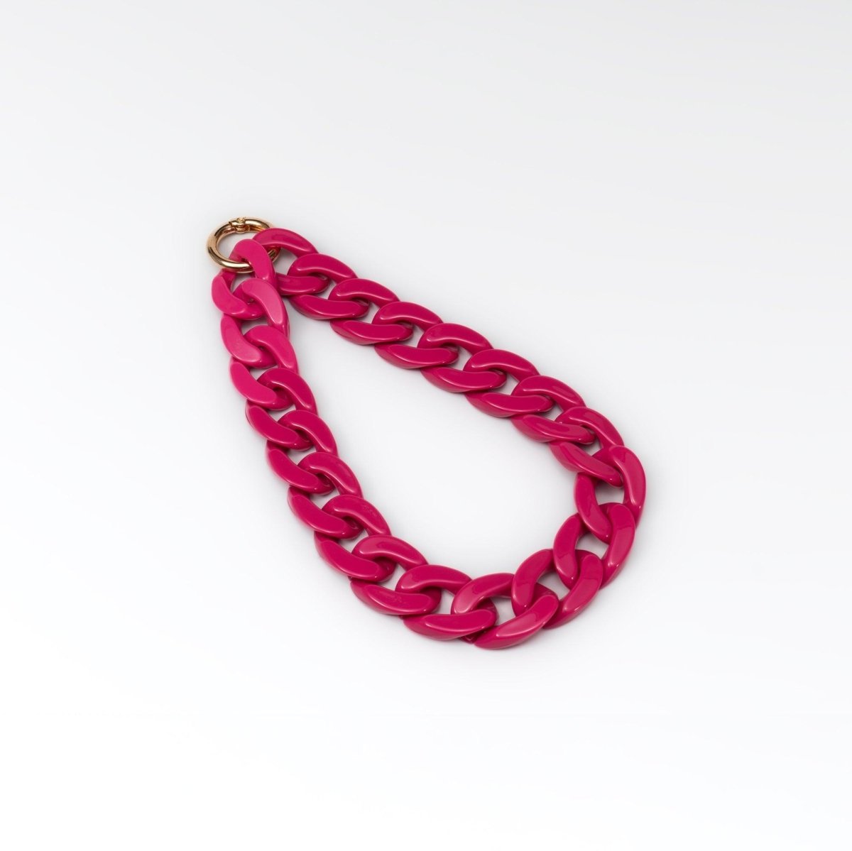 Cadena de lujo para celular fucsia, elegante y original, ideal para complementar fundas Leather Collection.