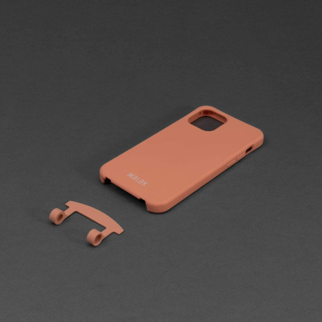 funda de teléfono 2 en 1 con cordón en color naranja, con pieza desmontable.