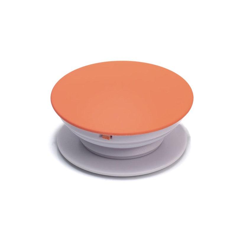 Soporte para celular Malak color naranja con sistema adhesivo para adaptar a case MALAK.
